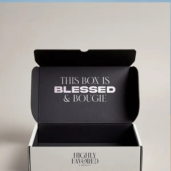 Close-up of White Shipping Boxes with printed logo