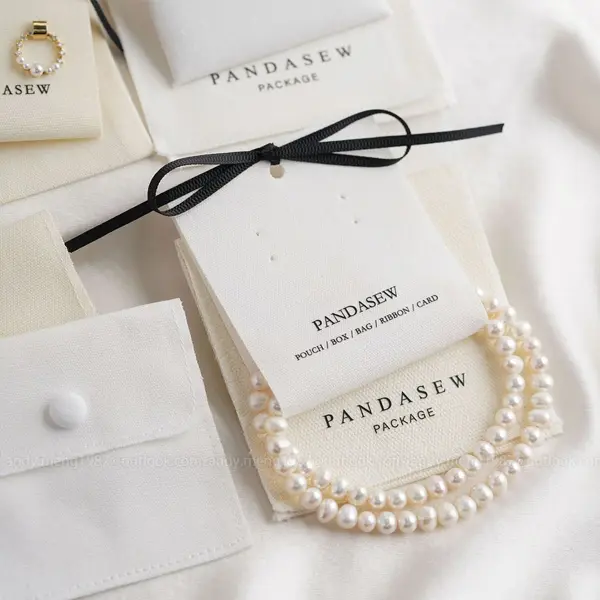 Custom jewelry hang tags with foil stamping for boutique brands